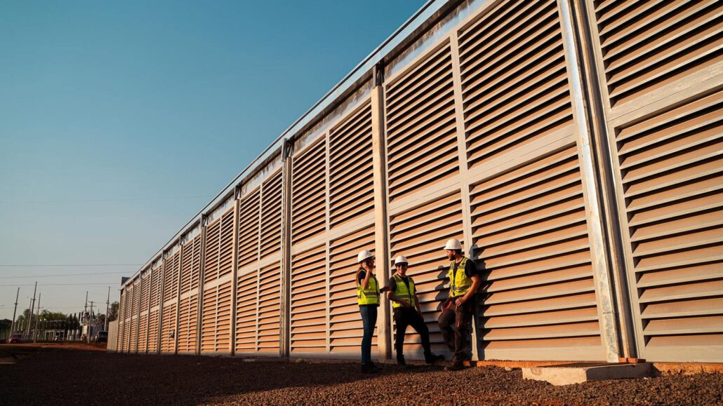 Bitfarm workers near facility